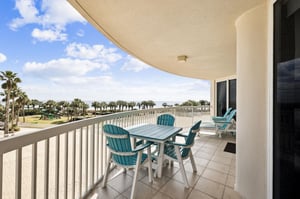 The private beachfront balcony offers stunning views where you can dine al fresco