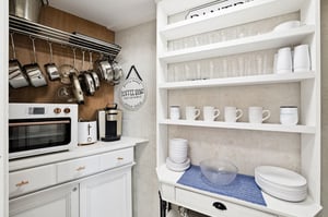 Fully equipped kitchen with additional supplies in the Upgraded pantry