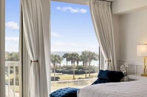 Wake up to stunning ocean views from your comfortable bed, where palm trees and pristine beaches create the perfect coastal escape.