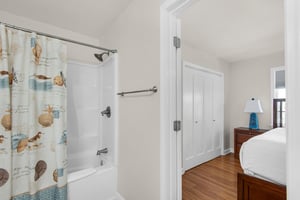 Bathroom 2 features a relaxing tubshower combo