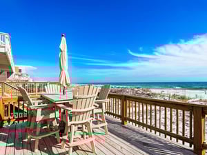 Soak up the Gulf views from your private deck, where comfortable seating awaits your morning coffee and sunset moments.