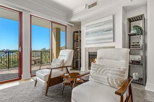 Sink into plush leather chairs by the crackling fireplace while soaking up stunning views through floortoceiling windows.