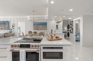Step into your gourmet kitchen where marble countertops and premium appliances invite you to create culinary masterpieces.