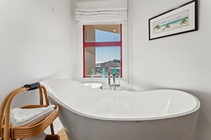 Enjoy a serene bath with sunset views for the perfect end to your day.