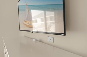 Convenient charging ports in Bedroom 1 and throughout unit