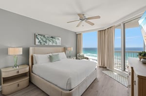 Wake up to breathtaking ocean views from your luxurious beachfront bedroom, where soft linens and sea breezes create the perfect coastal retreat.