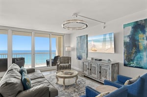 Your elegant living room frames stunning ocean views through floortoceiling windows, creating the perfect retreat.