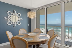 Your dining room opens to stunning ocean views, where elegant meals await at your beachfront table.