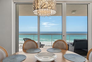 Dine with stunning ocean views where elegant lighting creates the perfect ambiance for memorable meals.