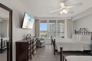 Relax in this elegant bedroom with city views, modern amenities, and comfortable twin beds perfect for your getaway.