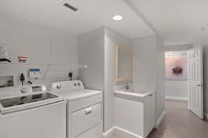 Your bright, dedicated laundry space makes staying fresh effortless with fullsize washer and dryer plus convenient utility sink for all your needs.