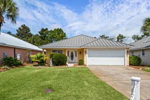 Charming singlestory home with convenient parking in a peaceful gated neighborhood.