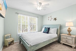 Bedroom 2  Drift off to peaceful sleep in your serene coastalthemed bedroom, complete with soft linens
