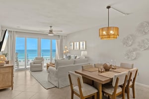 Wake up to stunning Gulf views from the bright, airy living space where coastal breezes flow through floortoceiling windows.