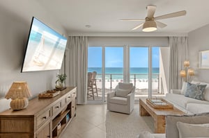 Relax in your bright beachfront living room with stunning beach views.