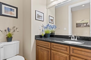 Half bathroom located just off the kitchen area.