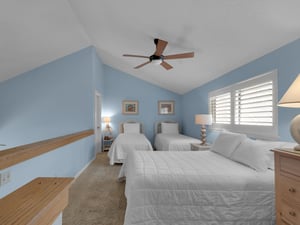 Bedroom 3 With 2 Twin and a Double Bed
