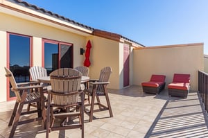 Dine and Relax on the Private Balcony off Bedroom 1