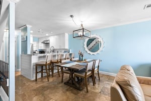 The openconcept living flows beautifully from the bright kitchen to elegant dining space.