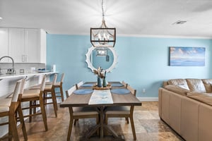Gather around your spacious dining table for memorable meals, with an open kitchen perfect for easy entertaining.