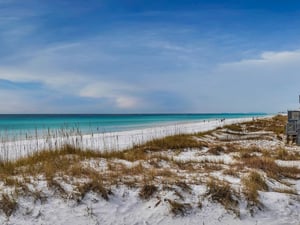 Pristine white sand beach just steps away