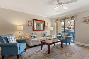 Living room opens to a patio