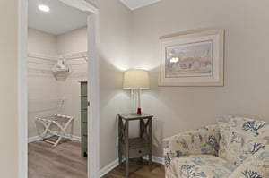 Bedroom 1 features a walkin closet and seating area