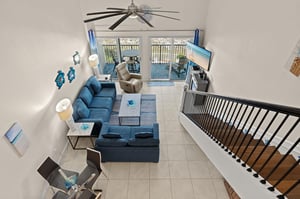 Enjoy your coastal escape from this airy, twostory condo with 2nd floor open loft room and additional bedroom in shared loft space.