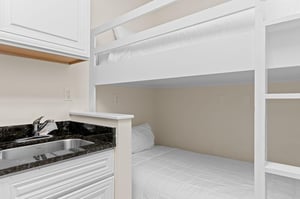 Builtin Twin Bunk Bed in Laundry Area for Extra Sleeping