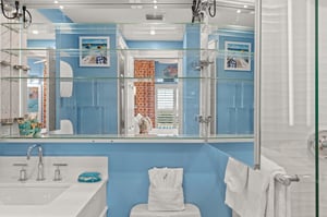 Bathroom 1 Vanity Opens to interior mirrors, allowing guests to see all angles