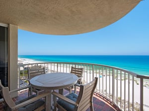 Your private balcony overlooks stunning turquoise waters and white sandy shores—perfect for morning coffee or sunset cocktails
