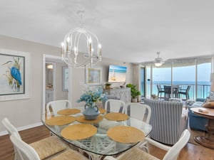 Gather for meals in this bright, coastalstyled dining area with stunning gulf views