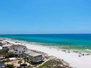 White sandy shores and turquoise Gulf waters