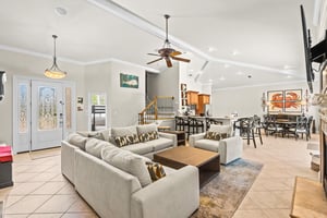 Sink into plush seating in this spacious openconcept living area