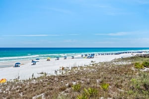 Pristine white sand with turquoise waters provide a scenic coastal setting near the property.