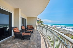 Lounge in cushioned chairs with footrests as gentle ocean breezes and the sound of waves create your perfect beach retreat.