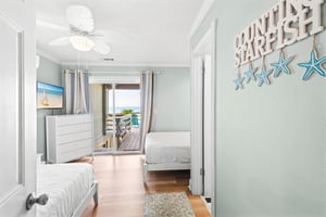 Bedroom 3 on lower beach level with 2 double beds