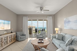 Step into your coastal retreat with soft colors and natural light. Relax on the cozy sofa or enjoy morning coffee while taking in ocean views from your private balcony.