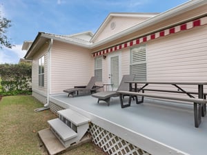 Back Porch Provides Seating Perfect for Enjoys Meals Outside