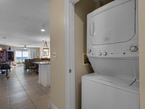 Unit has stackabke washer and dryer