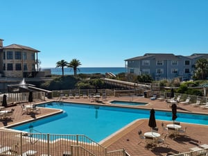 View of community pool and Gulf