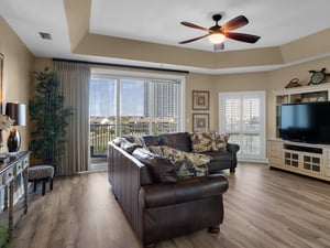 Lake Side Living Area with Balcony Access and Large TV