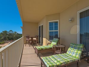 Large private balcony with comfortable furniture