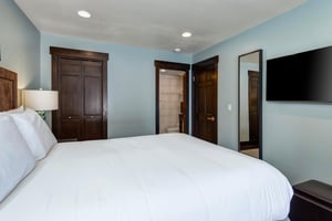 The bedroom with an en suite bathroom.