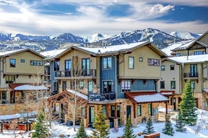 The Blackstone vacation rental in Canyons Village is surrounded by snowcapped peaks.