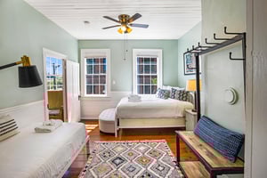 The third bedroom consists of a comfortable queen size bed, and a twin, with plenty of space to store or hang your belongings