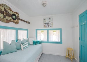 Main Cottage entry with daybed