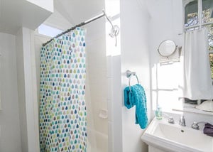 Bathroom with tubshower combo