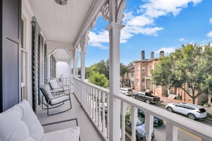 Watch the clouds roll by from your front porch from either level.