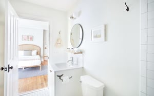 The full bath is opposite the bedroom.
